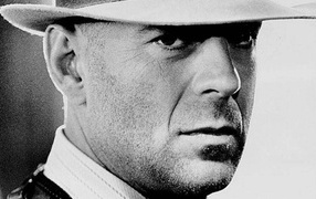 Famous Actor Bruce Willis in white hat
