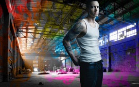 Eminem in an abandoned warehouse