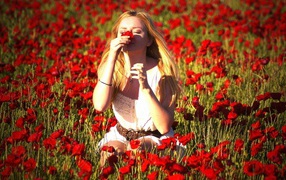 Girl on a poppy field