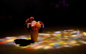 Vase on the floor with autumn colors