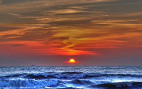 Blue sea and red sunset