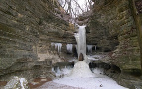 Frozen waterfall in the park