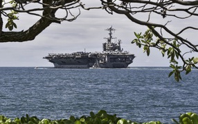 Aircraft carrier off the coast of