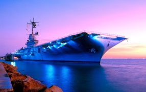 Ship on the horizon sunrise