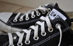 Branded black sneakers