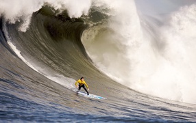 Surfing on a very big wave
