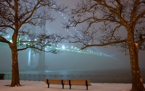 Lights bridge in fog