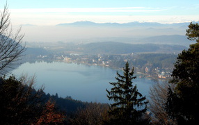 Fog over the lake Klopeiner See, Austria