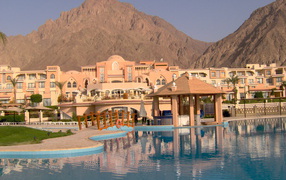 The hotel is on a background of mountains in the resort of Taba, Egypt