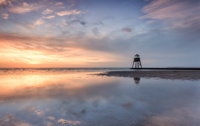 Photo of sunrise on the coast of the UK
