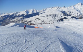 Downhill skiing in the ski resort of Les Arcs, France