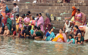 Residents of Varanasi resting near the river