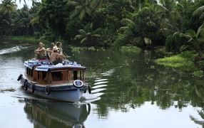 Tourists on a boat in Alapuzha