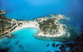 Голубая лагуна на курорте Вилласимиус, Италия