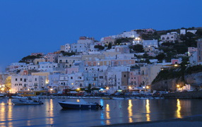 Evening lights at the beach on the island of Ponza, Italy
