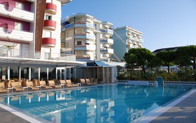 Hotel swimming pool in the resort of Lido di Ezolo, Italy