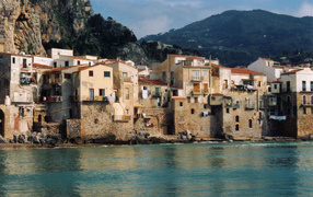 Houses near the water on the island of Sicily, Italy