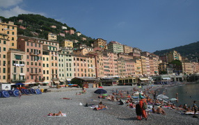 Relax on the beach in the resort of Imperia, Italy