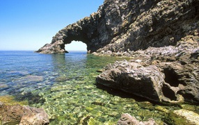 Rock on the coast of the island of Sicily, Italy