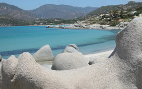 Rocky shore at the resort of Villasimius, Italy