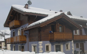 Snow-covered villa resort in Bormio, Italy