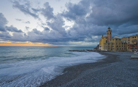Sunset on the beach in Liguria, Italy