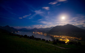 Full moon over the coastal city, Switzerland