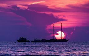 Boats at sunset at a resort in Pattaya, Thailand