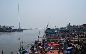 Boats on the shore at Cha Am, Thailand