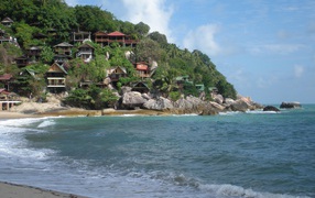 House on a rock near the shore on the island of Koh Phangan, Thailand