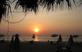 Sunset on the beach in the resort of Hua Hin, Thailand