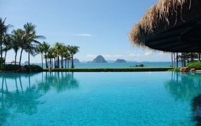 The hotel is on the beach at the resort of Krabi, Thailand