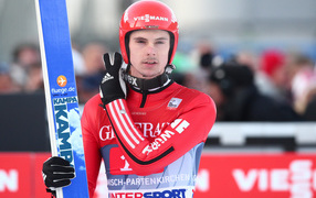 Обладатель золотой медали в дисциплине прыжки на лыжах с трамплина Андреас Ванк из Германии