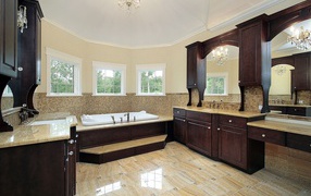 A spacious bathroom in brown tones