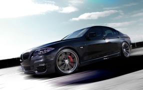 BMW 5 series at a speed of