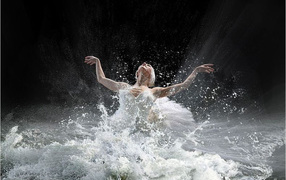 Ballerina dancing in water