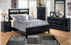 Black bed in the bedroom