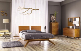 Easy style in the design of the bedroom
