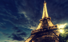 Eiffel tower on background of blue night sky