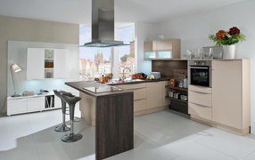 Вытяжка над столом в кухне