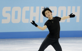 Обладатель золотой медали японский фигурист Юдзуру Ханю на олимпиаде в Сочи