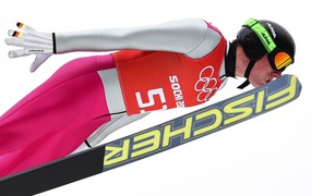 Обладатель серебряной медали немецкий лыжник Йоханнес Ридзек на олимпиаде в Сочи