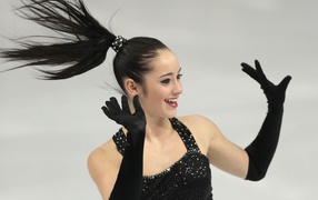 Обладательница серебряной медали канадская фигуристка Кэйтлин Осмонд на олимпиаде в Сочи