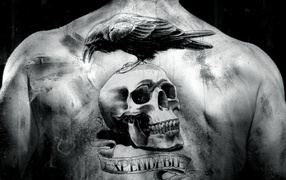 Тату череп на спине