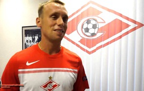 Spartak midfielder Denis Glushakov team logo on the background