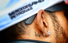 Tattoo behind the ear