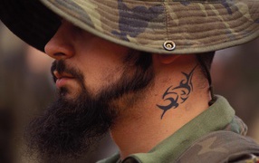 Tattoo on the neck of a soldier