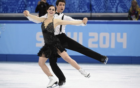 Тесса Вирчу и Скотт Мойр канадские фигуристы обладатели двух серебряных медалей