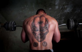 The skull on the back of the athlete