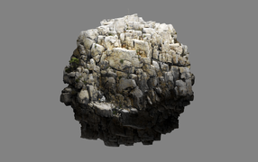 Круглый камень на сером фоне